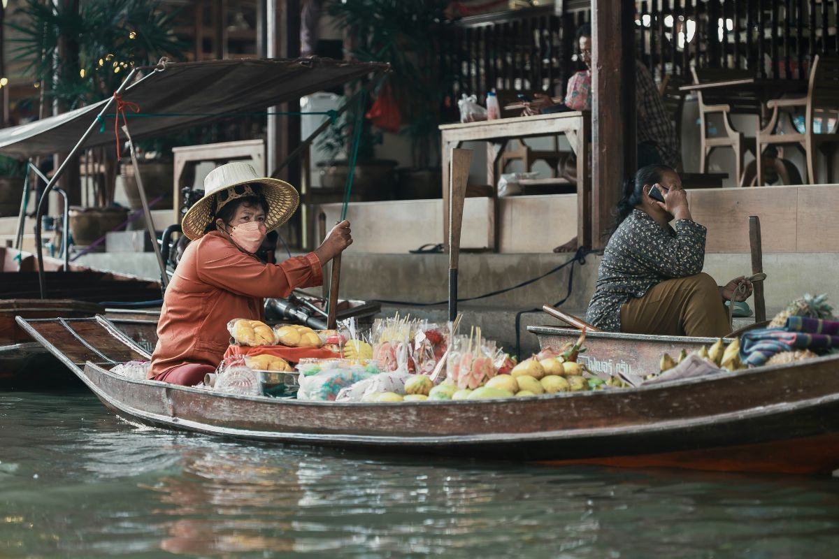 Elderly on long tail boat